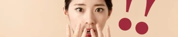 驚いた顔をしている女性